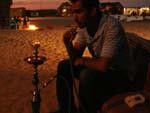 Travis smoking a Shisha