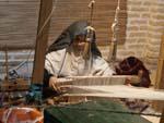 Women making traditional nomad scarfs