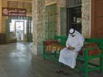 Qatari man sitting on bench